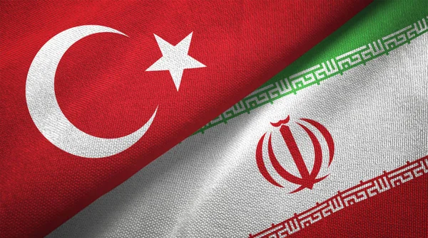 土耳其和伊朗国旗一起纺织布 织物纹理 — 图库照片