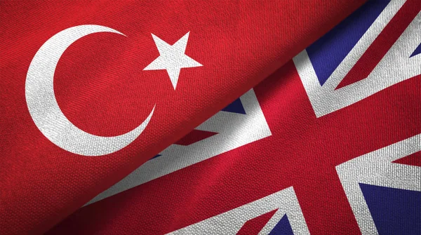 Turkey and United Kingdom flags together textile cloth, fabric texture