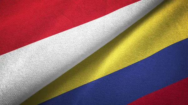 Indonesia and Colombia flags together textile cloth, fabric texture