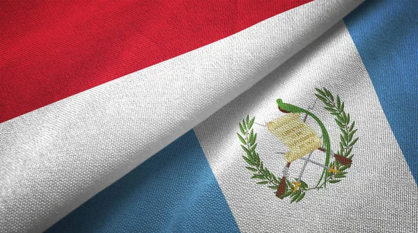 Indonesien Och Guatemala Flaggor Grupp Textil Duk Tyg Textur — Stockfoto