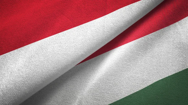 Indonesia and Hungary flags together textile cloth, fabric texture