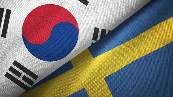 Kore Cumhuriyeti ve İsveç bayrakları birlikte tekstil kumaş, kumaş doku