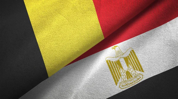 Belgium and Egypt flags together relations textile cloth, fabric texture. Text on egyptian flag means - Arab Republic of Egypt