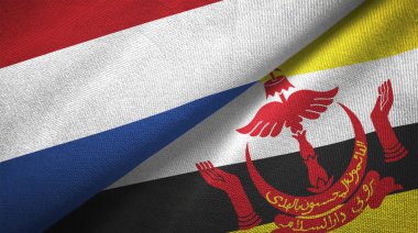 Hollanda ve Brunei Darussalam bayrakları birlikte ilişkiler tekstil kumaş, kumaş dokusu. Metin brunei bayrağı anlamına gelir - her zaman Tanrı'nın rehberlik hizmetinde