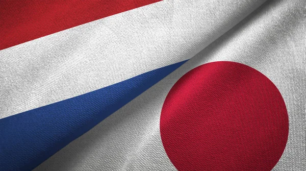 Netherlands Japan Flags Together Relations Textile Cloth Fabric Texture — Stock Photo, Image