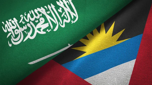 Saudi Arabia and Antigua and Barbuda flags. Text on saudi arabian flag means - There is no god but God, Muhammad is the Messenger of God