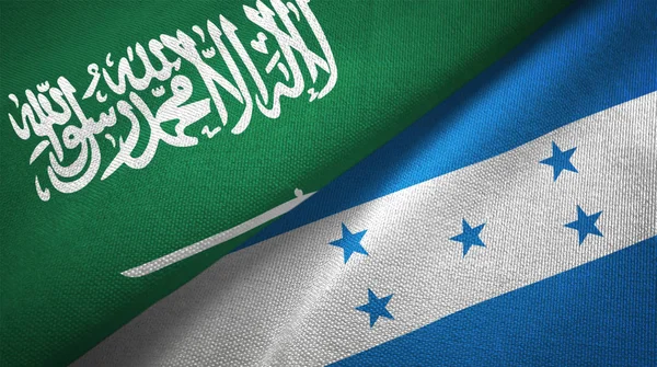 Saudi Arabia and Honduras flags. Text on saudi arabian flag means - There is no god but God, Muhammad is the Messenger of God