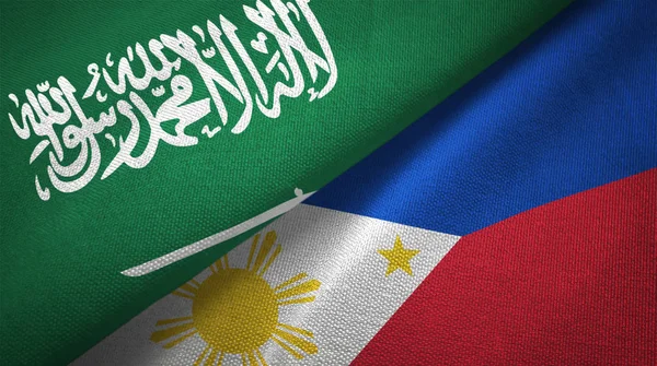 Saudi Arabia and Philippines flags. Text on saudi arabian flag means - There is no god but God, Muhammad is the Messenger of God
