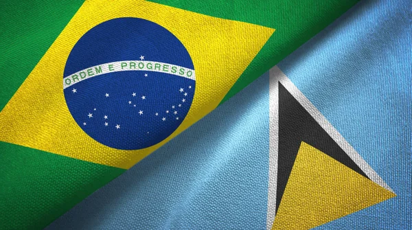 巴西和圣卢西亚将两面折叠的国旗放在一起 — 图库照片