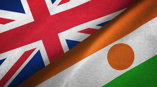 Reino Unido Níger Duas Bandeiras Dobradas Juntas — Fotografia de Stock