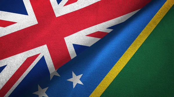 United Kingdom and Solomon Islands two folded flags together