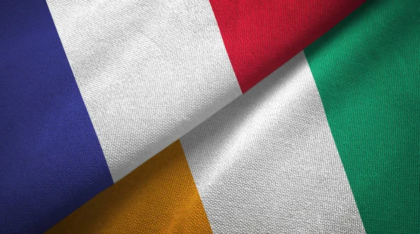 法国和科特迪瓦象牙海岸两面叠起的国旗 — 图库照片