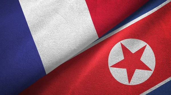 France North Korea Two Folded Flags Together — Stock Photo, Image
