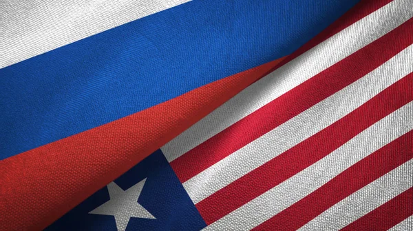 Rusia Liberia Dos Banderas Plegadas Juntas — Foto de Stock