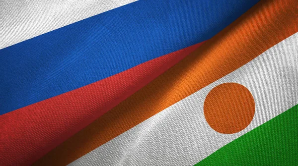 Rusland Niger Twee Gevouwen Vlaggen Samen — Stockfoto