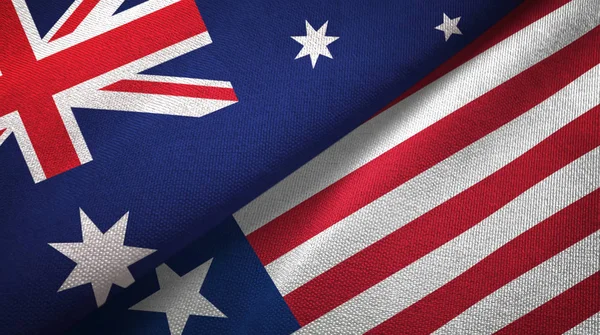 Australia Liberia Two Folded Flags Together — Stock Photo, Image