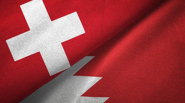 Switzerland and Bahrain two folded flags together