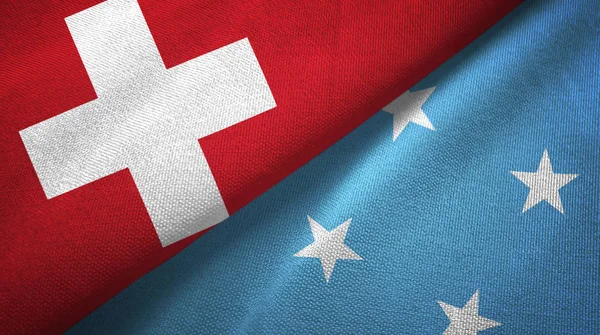 スイス連邦共和国およびミクロネシア つ折りフラグ一緒に — ストック写真