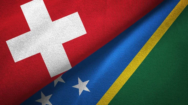 Suiza Islas Salomón Dos Banderas Plegadas Juntas — Foto de Stock