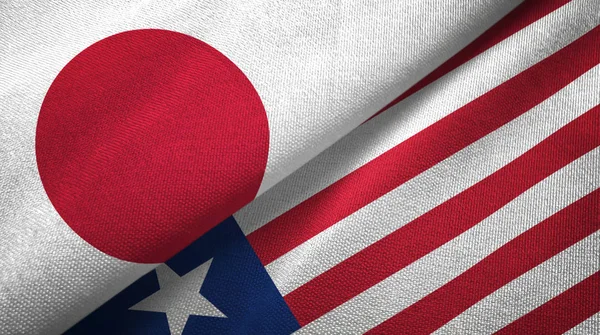 Japan Liberia Two Folded Flags Together — Stock Photo, Image