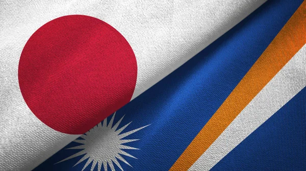 Japón Islas Marshall Dos Banderas Plegadas Juntas — Foto de Stock