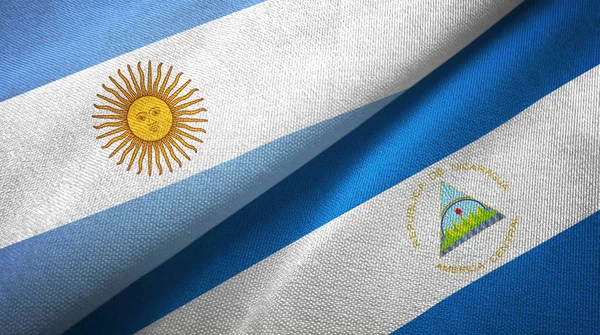 Αργεντινή Και Νικαράγουα Δύο Σημαίες Μαζί Διπλωμένο — Φωτογραφία Αρχείου