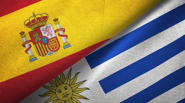 Spain and Uruguay two folded flags together