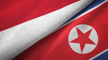 Endonezya'da ve Kuzey Kore iki katlanmış bayrakları birlikte