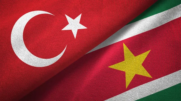 Turkey and Suriname two folded flags together