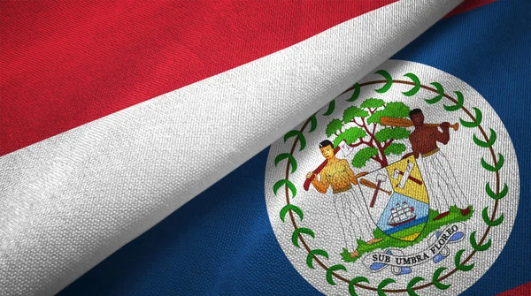 Indonesië Belize Twee Gevouwen Vlaggen Samen — Stockfoto