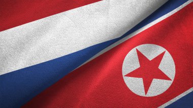 Hollanda ve Kuzey Kore iki katlanmış bayrakları birlikte