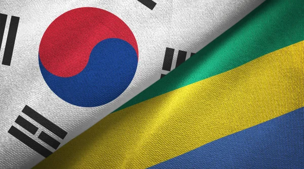 Güney Kore ve Gabon bayrakları bir arada.