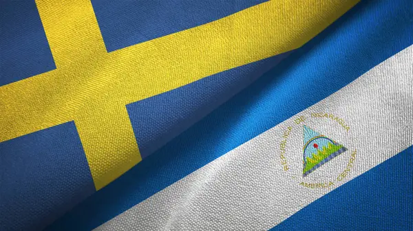 Suecia Nicaragua Dos Banderas Plegadas Juntas —  Fotos de Stock