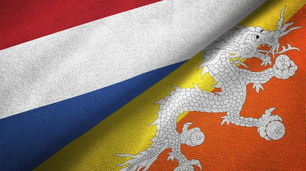 Nizozemsko Bhútán Dvě Skládané Vlajky Dohromady — Stock fotografie