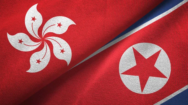 Hong Kong Kuzey Kore Iki Katlanmış Bayrakları Birlikte — Stok fotoğraf