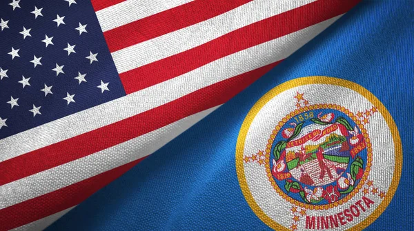 Estados Unidos e Minnesota estado duas bandeiras de pano têxtil, textura de tecido — Fotografia de Stock