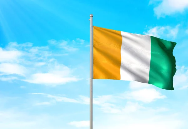 Cote d'Ivoire flag waving sky background 3D illustration — Stock Photo, Image
