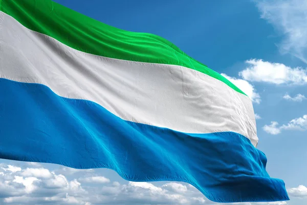 Sierra Leone flag waving sky background 3D illustration — Stock Photo, Image