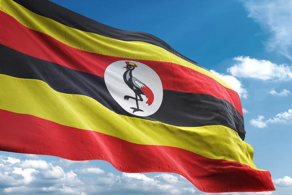 Uganda Flagge weht Himmel Hintergrund 3D-Illustration — Stockfoto