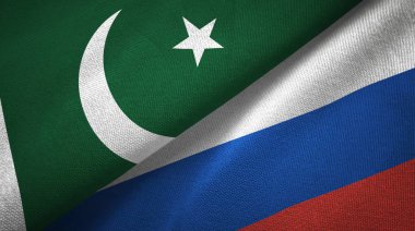 Pakistan and Russia two flags textile cloth, fabric texture