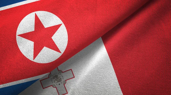 North Korea and Malta two flags textile cloth, fabric texture — Stock Photo, Image