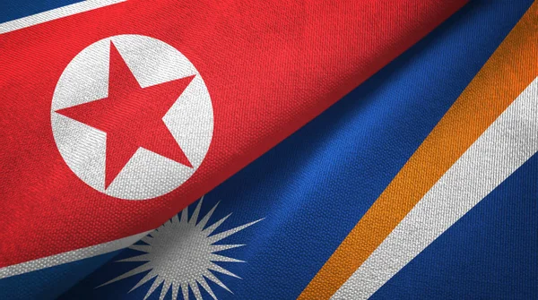 North Korea and Marshall Islands two flags textile cloth, fabric texture — Stock Photo, Image