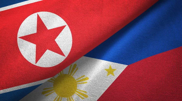 North Korea and Philippines two flags textile cloth, fabric texture — Stock Photo, Image