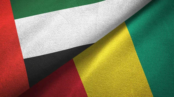 Emirati Arabi Uniti e Guinea due bandiere tessuto, tessitura tessuto — Foto Stock