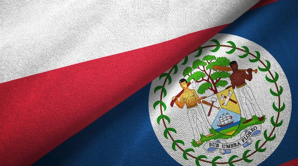 Pologne et Belize deux drapeaux tissu textile, texture du tissu — Photo