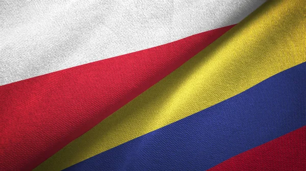 Polen en Colombia twee vlaggen textieldoek, weefsel textuur — Stockfoto