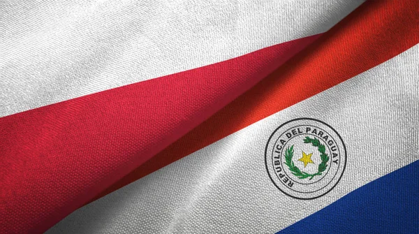 Poland and Paraguay two flags textile cloth, fabric texture — Stock Photo, Image