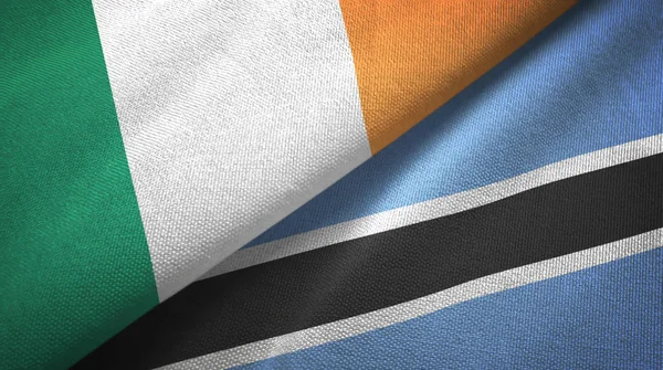 Irland und botswana zwei flaggen textilstoff, textur — Stockfoto