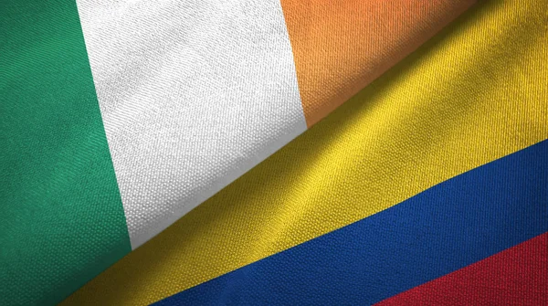 アイルランドとコロンビア2つの旗織物布、生地の質感 — ストック写真