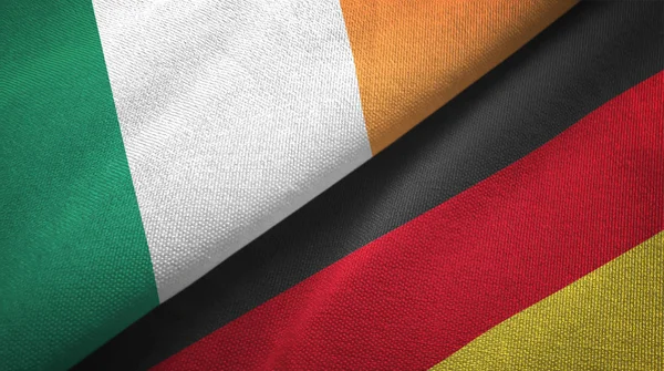 アイルランドとドイツ2つの旗織物布、生地の質感 — ストック写真